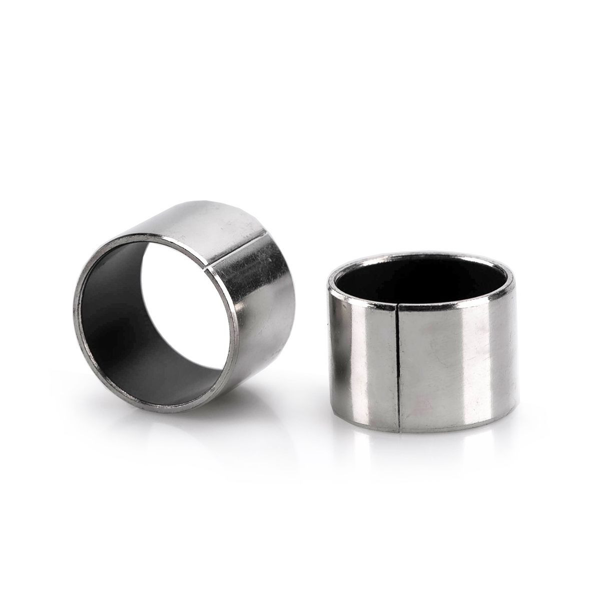 Self-lubricating steel backed bushings for pumps